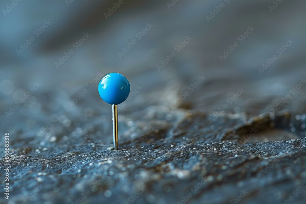 Single Blue Push Pin on a Surface Single Blue Push Pin on a Surface