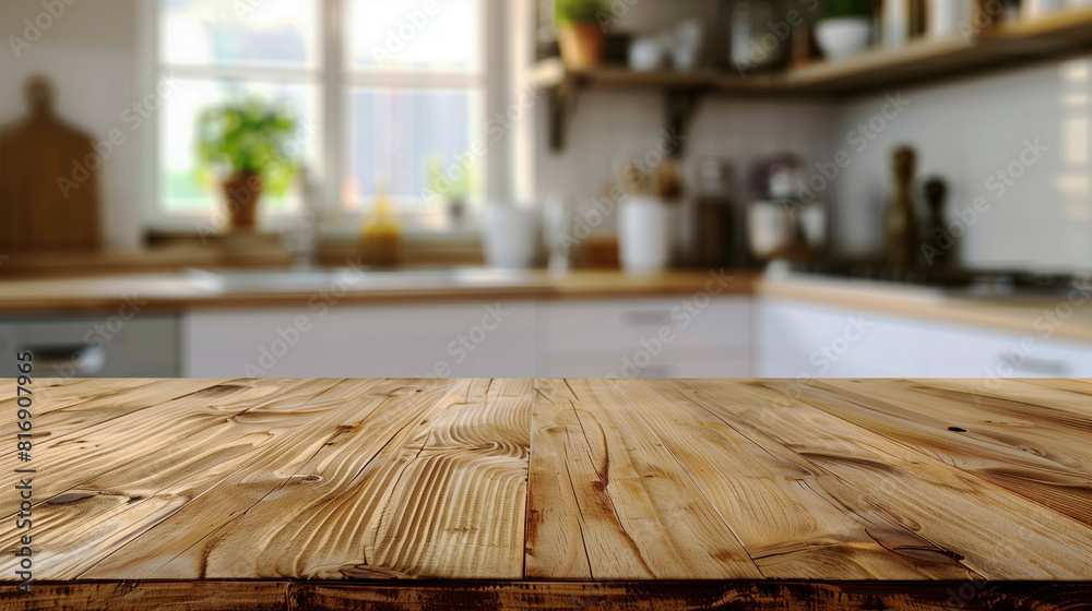 A wooden kitchen countertop with a blurred background of a modern kitchen featuring shelves with plants, jars, and kitchen utensils, evoking a warm and inviting atmosphere.
