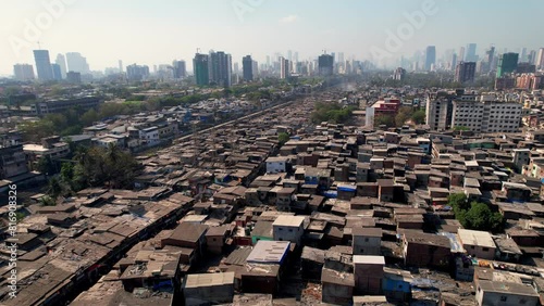 Dharavi Slum in Mumbai India, Aerial View. Poor Housing and Lack of Hygiene in Famous Neighborhood. Dharavi is considered to be one of the largest slums in the world and the largest in Asia. photo