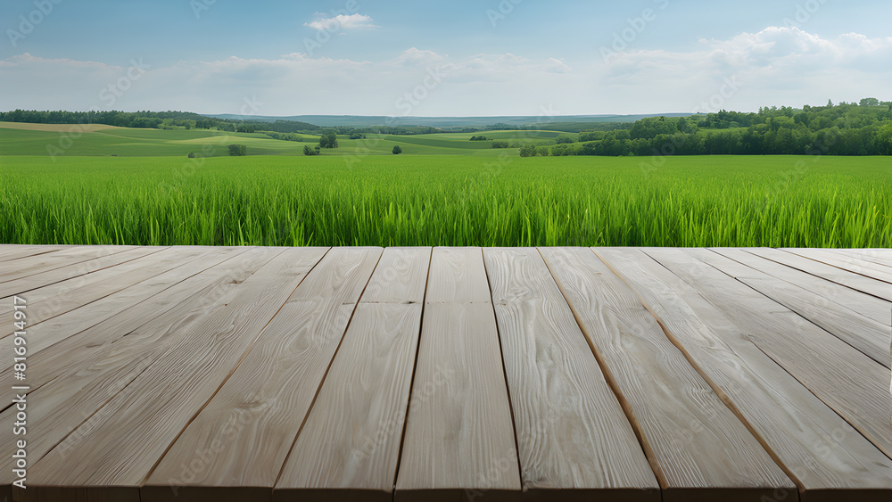 a wooden table with a field of green grass and a green field with a green field in the background. a wooden table with a field of green grass and a green field with a green field in the background.