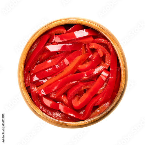 Obraz na plátně Red pepper salad, pickled red bell pepper strips, in a wooden bowl