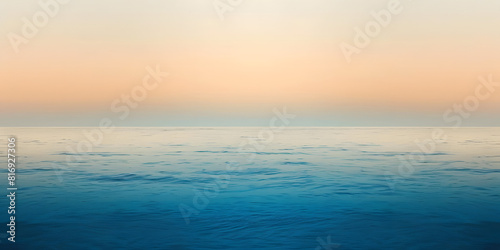 Soothing gradient from sandy beige to deep ocean blue, perfect for beach-themed products or relaxed lifestyle goods