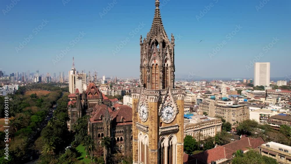Aerial view of Rajabai Clock Tower in Mumbai, India, Colaba district. 1878 clock tower modeled after Big Ben. Victorian architecture in India