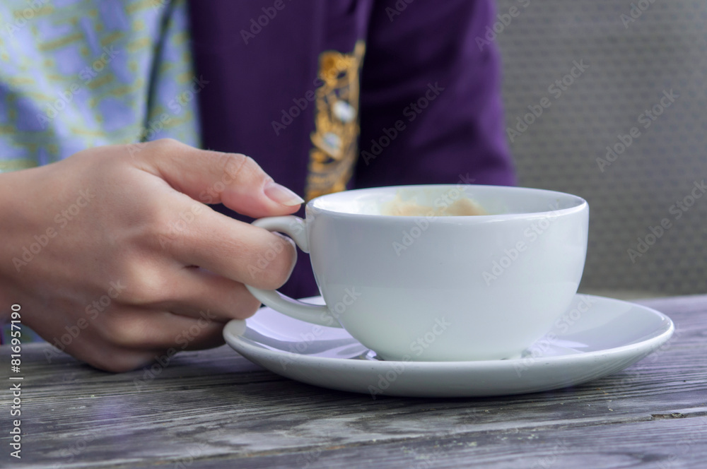 girl drinking cappuccino coffee in a cafe girl drinking cappuccino coffee in a cafe