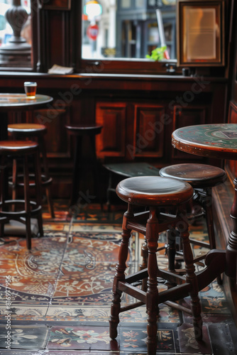 Warm and cozy atmosphere of traditional Irish pub. Warm yellow lights in empty interior of rural bar in Ireland. photo