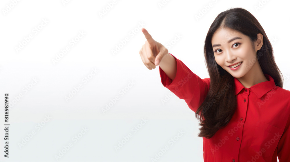 Cheerful asian woman in red blouse pointing away Cheerful asian woman in red blouse pointing away