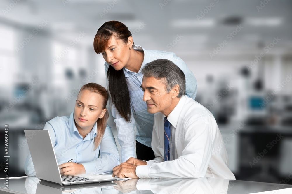 Business people work together in the office Business people work together in the office