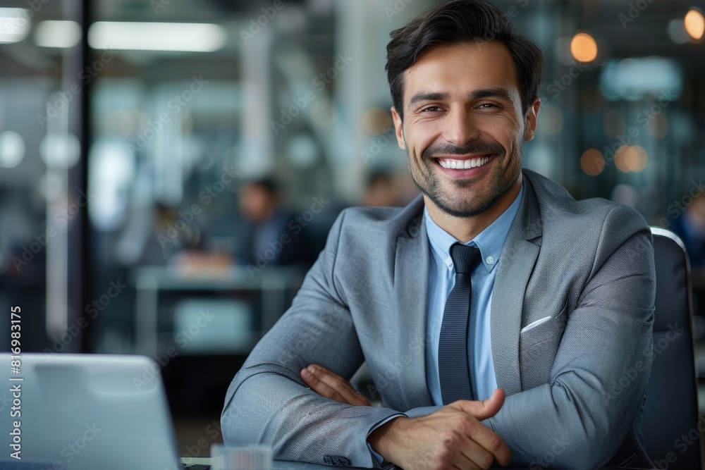 Fototapeta premium Smiling Businessman in Office, Confident Professional in Business Setting 