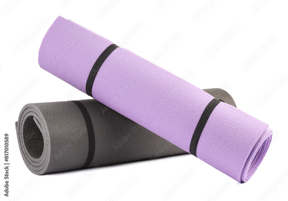 Grey and violet fitness mat isolated on white. Sports equipment Grey and violet fitness mat isolated on white. Sports equipment