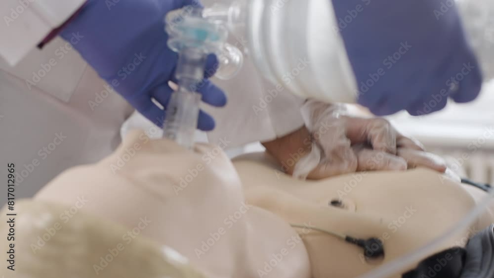 Training in first aid, oxygen mask and indirect heart massage. Slow motion Training in first aid, oxygen mask and indirect heart massage. Slow motion