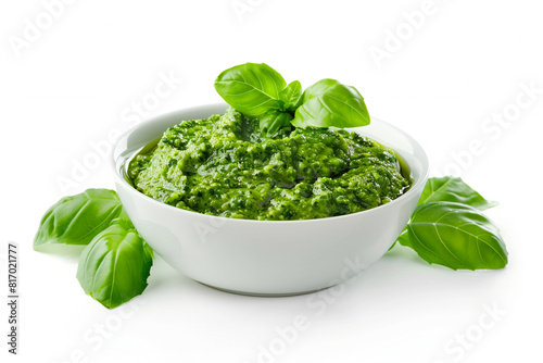 Fresh homemade pesto sauce white bowl basil leaves. Italian cuisine healthy