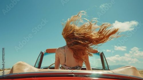 Exhilarating Summer Convertible Drive Under Cloudless Sky with Flowing Hair