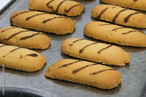 Kue lidah kucing or cat's tongue cookies. traditional cookies for eid holiday in indonesia. kue lebaran.