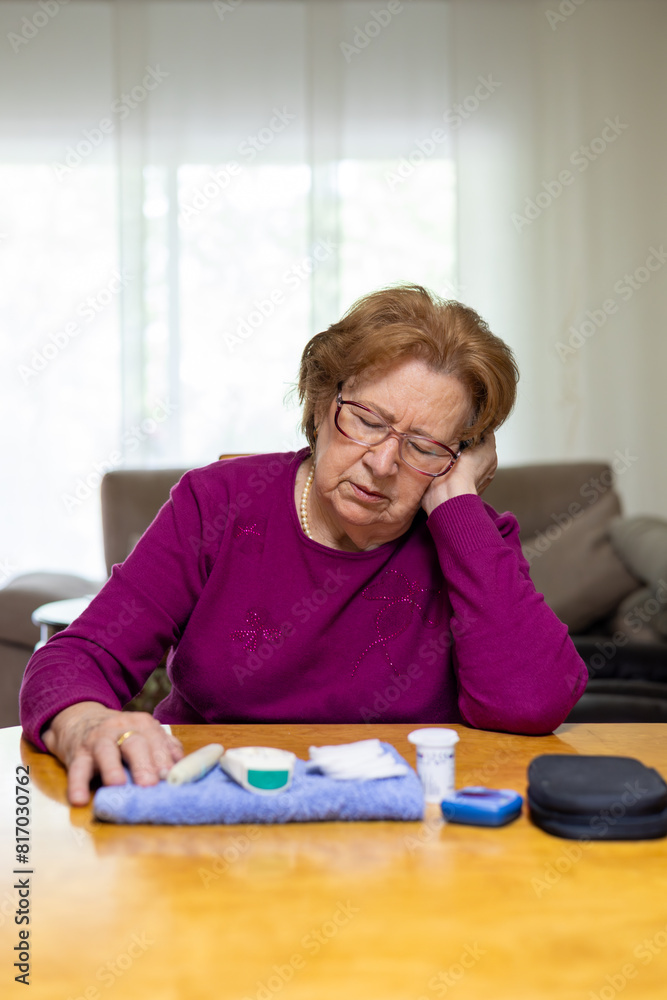 Elderly woman experiencing hypoglycemia at home Elderly woman experiencing hypoglycemia at home
