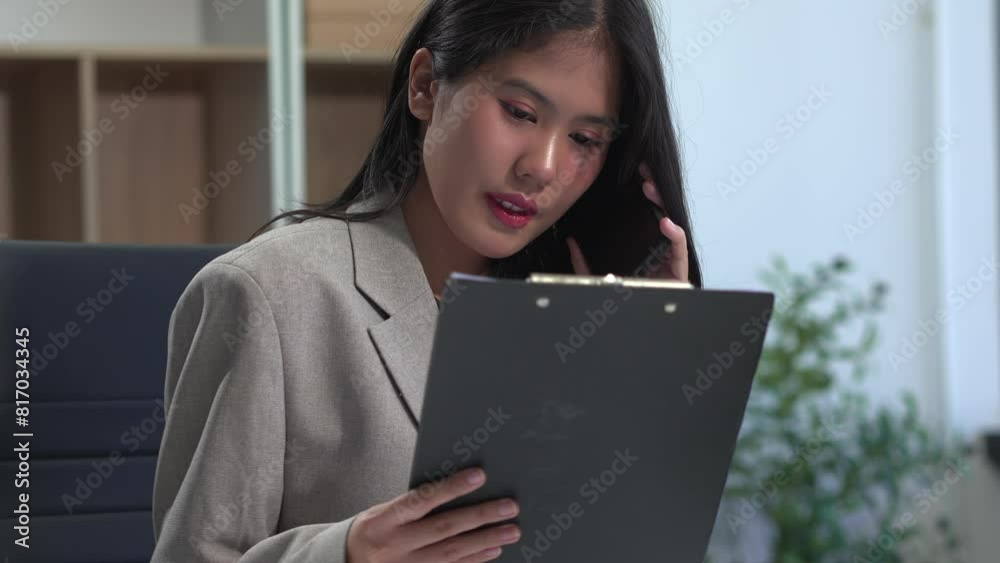 Business women talk mobile phones update tasks with milestones progress planning while working on laptop computers, online business, work from home, teleworking concept. Business women talk mobile phones update tasks with milestones progress planning while working on laptop computers, online business, work from home, teleworking concept.