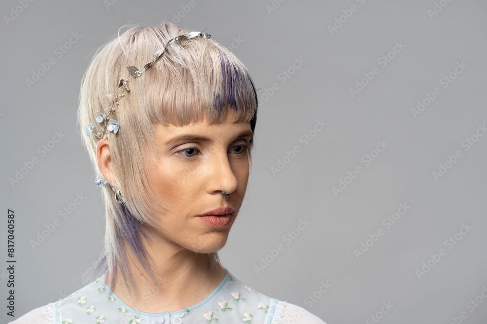 Side Profile Portrait of Woman with Septum Piercing and Floral Top - Modern and Stylish Side Profile Portrait of Woman with Septum Piercing and Floral Top - Modern and Stylish