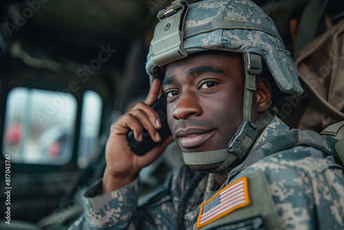 US Soldier using cellphone to his family from the military base © Rattanapon
