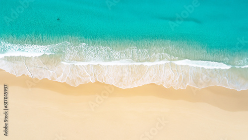 top view beautiful sandy beach and soft blue ocean wave  background © Rachanon
