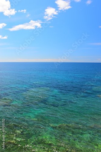 Budva, Montenegro - May 04, 2024 : The Old Town Fortress in Budva. A stone wall on the shore of the Adriatic Sea in Montenegro. Horizontal. On a hot, sunny, spring afternoon.