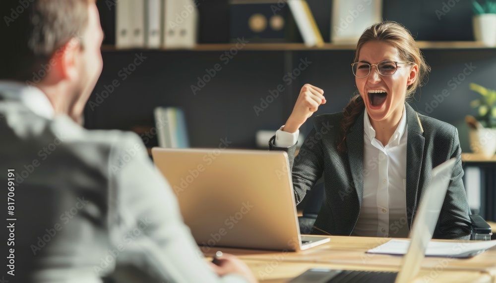 Business people celebrating success in office.