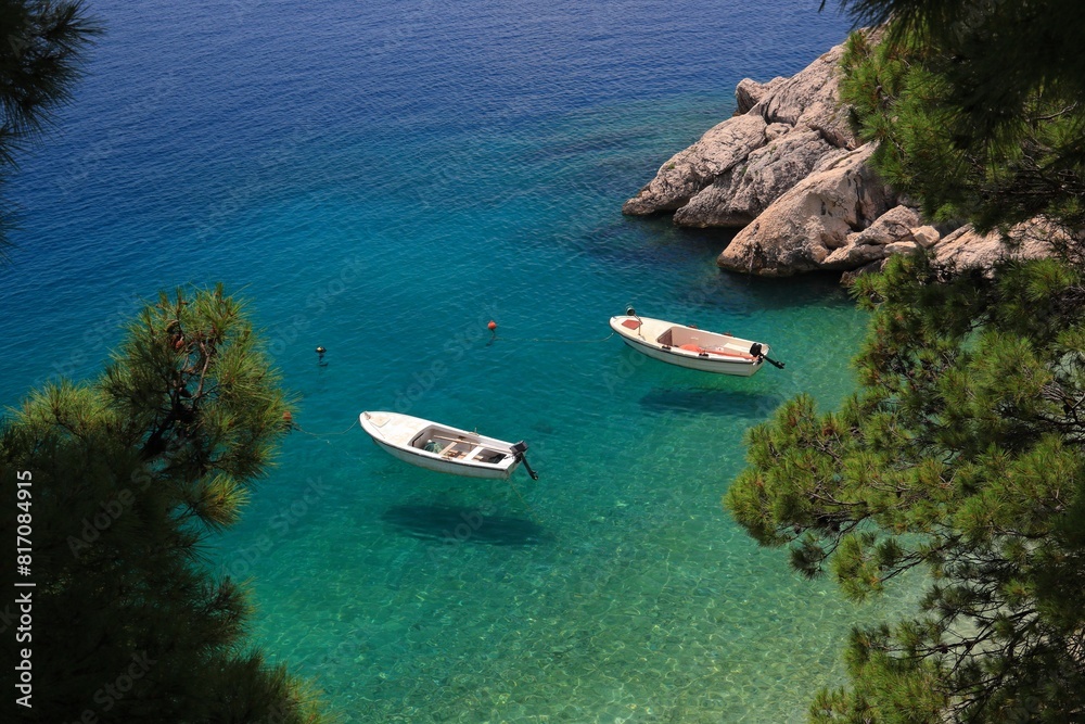 Levitating boats in clear water of Adriatic in Croatia