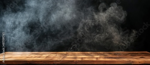 empty wooden table with smoke float up on dark background Empty Space for display your products AI generated
