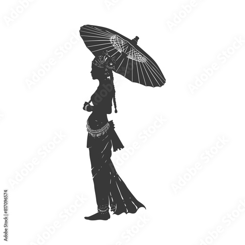 silhouette independent thai women wearing chut thai with umbrella black color only