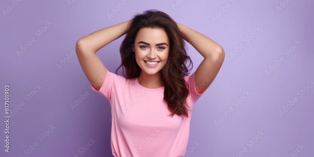 Panoramic photo of a young brunette woman in a pink shirt with a Hollywood smile on a studio background Panoramic photo of a young brunette woman in a pink shirt with a Hollywood smile on a studio background