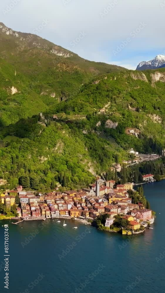 Aerial drone view of Varenna village near Lake Como, Italy. Vertical Aerial drone view of Varenna village near Lake Como, Italy. Vertical