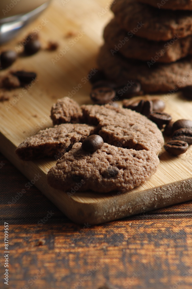 Fototapeta premium chocolate chip cookies on wooden table