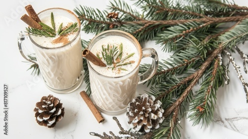 Festive eggnog in decorative glasses, perfect for holiday marketing and recipe features.
