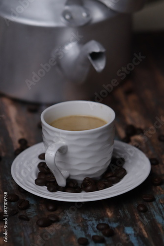cup of coffee with coffee beans 