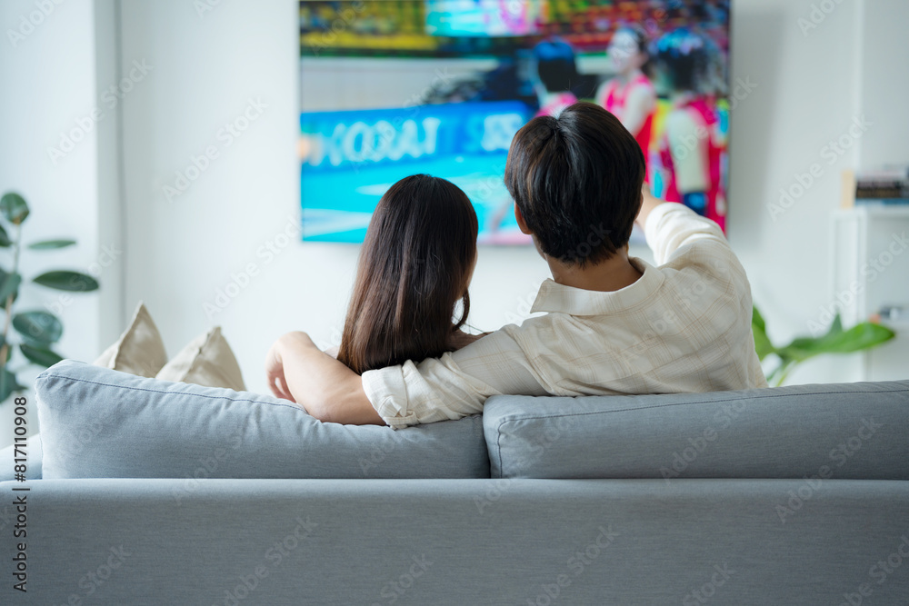 Cozy couple enjoying movie night at home Cozy couple enjoying movie night at home