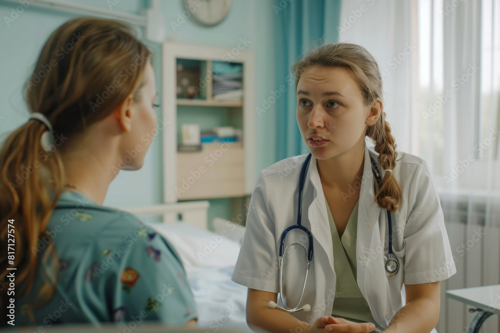 Female doctor talking to woman during medical appointment Female doctor talking to woman during medical appointment