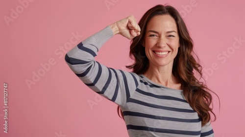 A Smiling Woman Flexing Arm photo