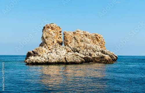 Landscape of Mediterranean sea with Faraglioni of Scopello at Zingaro Nature Reserve, Sicily, Italy