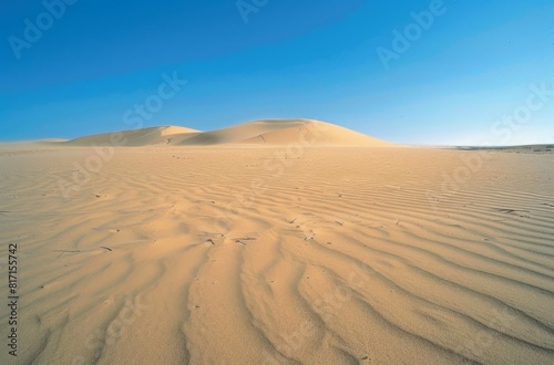 Endless Desert Horizons  Sand Dunes Under Clear Blue Sky