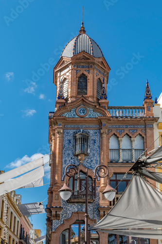 The characteristic architecture of the historic center of Seville, Spain, in the Plaza Jesús de la Pasión square photo