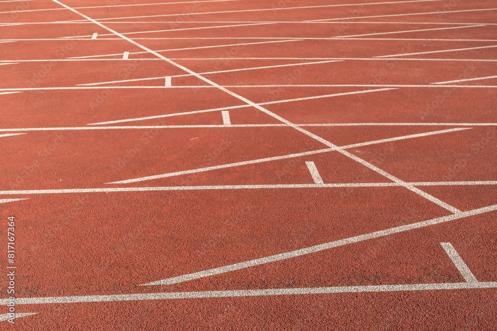  Synthetic track with white lines in the athletics stadium..