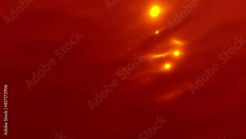 Very large blue-green algae bloom sufficient to color of ponds and ditches bloody-red, Close-up of red water surface with sun glare and ripples photo
