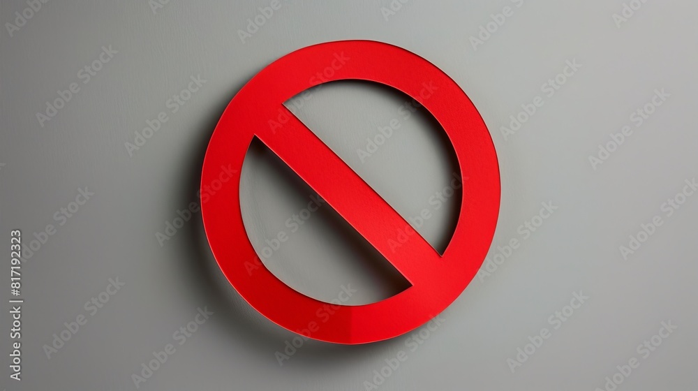 A red prohibition sign cut out of paper against a gray background. A red prohibition sign cut out of paper against a gray background.