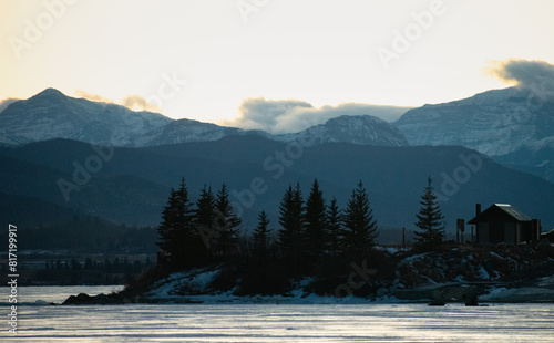 Mountains over an island in a frozen lake