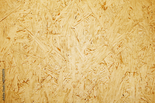 Chipboard OSB texture painted in orange color.