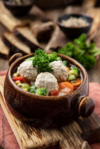Soup with meatballs and vegetables. Concept of healthy and diet food