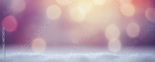 The snowy landscape is illuminated by soft bokeh lights in this winter scene.