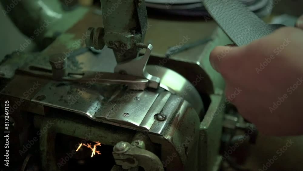 Master tailor sewing shoes. Manufacturing process in shoe factory. Master tailor sewing shoes. Manufacturing process in shoe factory.