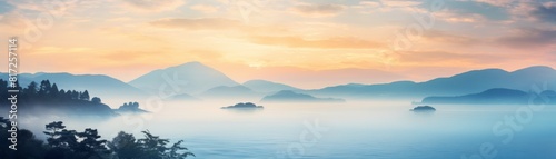 A misty sunrise over the ocean with fog obscuring the view. 