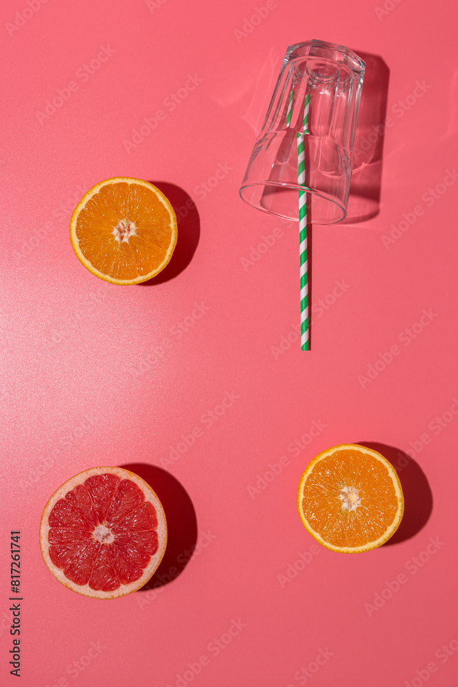 Creative composition with fruits and glass on pink background with hard shadows. Summer minimal concept. Creative composition with fruits and glass on pink background with hard shadows. Summer minimal concept.