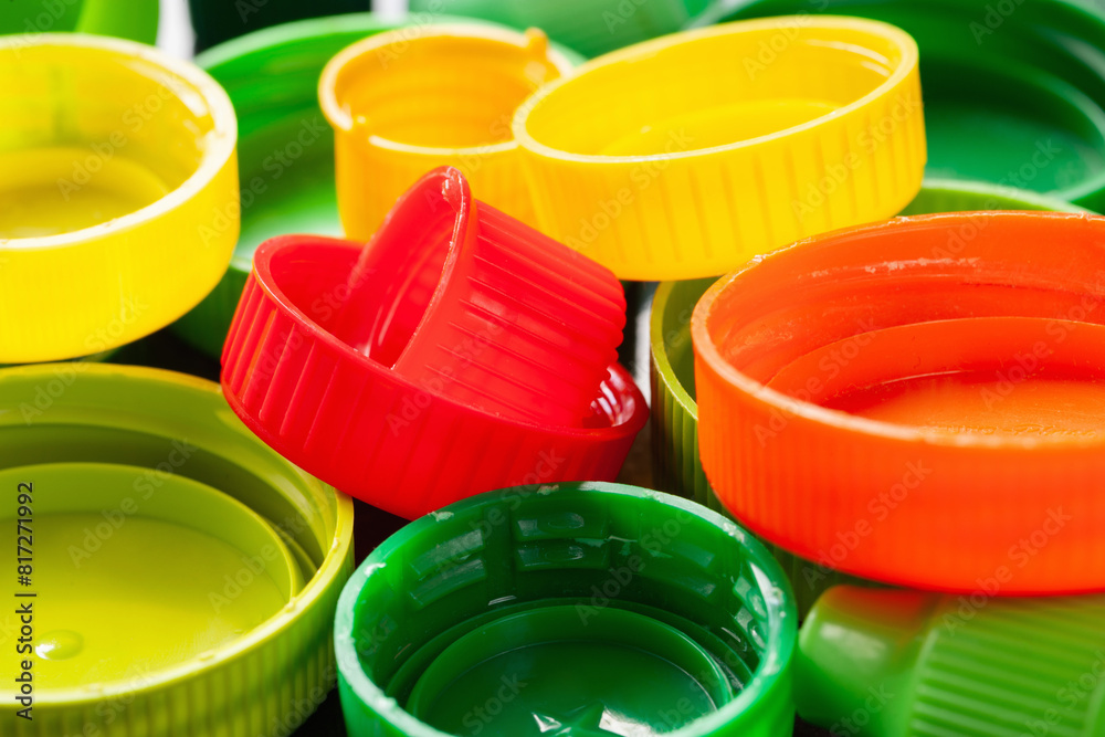 Plastic lids. Colored plastic caps. Recycling of plastic Plastic lids. Colored plastic caps. Recycling of plastic