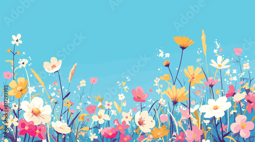 Spring grass and flowers border on blue sky backgro photo